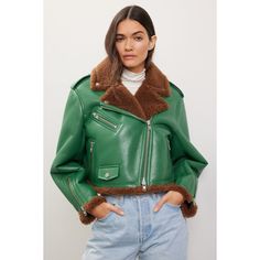 Green faux leather (70% Polyurethane, 30% Polyester/100% Polyester). Jacket. Long sleeves. Collar. Front zipper closure. 20" from shoulder to hemline. Imported. Trendy Leather Jacket With Padded Collar For Fall, Trendy Biker Jacket With Padded Collar For Fall, Fall Leather Biker Jacket With Faux Fur Lining, Trendy Faux Leather Outerwear With Asymmetrical Zip, Chic Spring Biker Jacket With Padded Collar, Trendy Green Leather Winter Jacket, Winter Work Faux Leather Cropped Jacket, Fall Outerwear With Asymmetrical Zip Closure, Trendy Green Leather Jacket For Winter