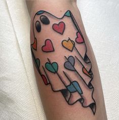 a person with a tattoo on their arm that has hearts in the shape of a map