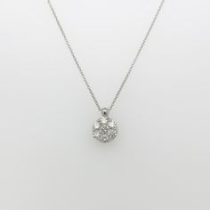 A fine Italian gold & diamond necklace.  In 14k white gold.  Prong set with 7 round brilliant cut diamonds in a stylized floral form.  (Overall ca. 3/4 total carat weight; Color range: G-H; Clarity range: VS-SI)  Accompanied by a GEMLAB (Gemological Appraisal Laboratory) report.  Simply a wonderful diamond pendant for any occasion!  Date: 20th Century  Overall Condition: It is in overall good, as-pictured, used estate condition with some fine & light surface scratches and other signs of expected Timeless Silver Round Cut Diamond Necklace, Timeless Silver Diamond Necklace With Round Cut, Silver Round Cut Diamond Necklace Timeless Style, Dazzling Platinum Necklace With Brilliant Cut, Dazzling Round Cut Diamond Necklace, Timeless Silver Diamond Cut Necklace, Diamond Cut Diamond White Platinum Necklace, Elegant Silver Solitaire Necklace With Single Cut Diamonds, Exquisite Silver Diamond Cut Diamond Necklace