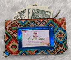 Features:- slim vinyl and fabric wallet fits everything you need and makes swapping purses a snap- measures 4 in x 7 in- 6 card slots- ID window- cash pocket- zippered pocket- made of faux leather look vinyl and cotton fabric- D-ring can be clipped to a purse tether or key ring**Each wallet is unique. Pattern placement will vary. Please indicate any preferences for character placement. We will do our best to accommodate all requests.** Fabric Wallet, Star Wars Shirts, Badge Holders, D Ring, Key Ring, Disney World, Card Slots, Slots, Cotton Fabric