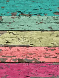 an old wooden wall painted in different colors