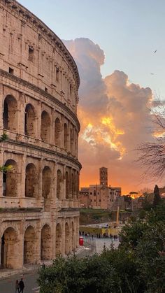 the roman colossion at sunset in rome, italy