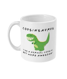 a white mug with a green dinosaur on it's side and the words friendssauruss