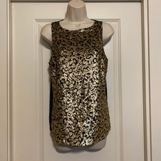 Never Worn! Cheetah Print Sequin Sleeveless Blouse With Sheer Black Back Leopard Print Sleeveless Tank Top For Party, Chic Gold Sleeveless Top, Elegant Sleeveless Leopard Print Tops, Chic Leopard Print Sleeveless Top, Gold Sleeveless Blouse Tank Top For Night Out, Glamorous Gold Sleeveless Tank Top, Gold Sleeveless Blouse For Night Out, Chic Leopard Print Top For Party, Chic Leopard Print Party Top