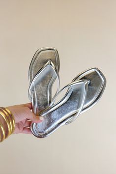 Get ready to shine this summer with the Liliana Sandals in silver! These lightweight square toe sandals feature small straps for a perfect fit. Perfect for adding some sparkle to your summer wardrobe. Silver Sandals Outfit, Sandals Outfit Summer, Silver Shoe, Cowgirl Couture, One Piece & Sets, Wedge Heel Boots, Square Toe Sandals, Sandals Outfit, Jumpsuit Outfit