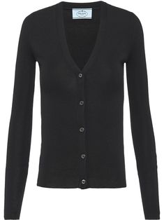 Black silk/cashmere V-neck buttoned cardigan from PRADA featuring fine knit, V-neck, front button fastening, long sleeves, ribbed cuffs and ribbed hem. | Prada V-neck buttoned cardigan