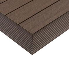 a close up view of a decking board with dark woodgrain on it