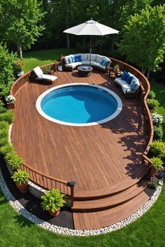 an above ground pool surrounded by wooden decking