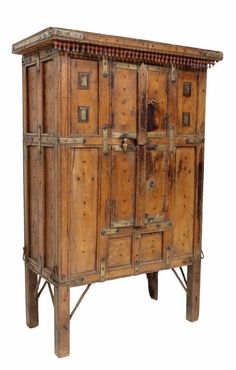 an old wooden cabinet with many doors and drawers on it's legs, isolated against a white background