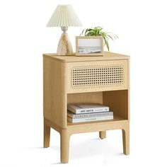 a wooden night stand with a lamp on top