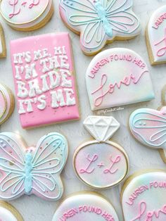 decorated cookies with words and butterflies on them