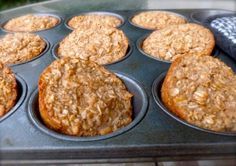 muffins are being cooked in a pan on the stove top and ready to be eaten