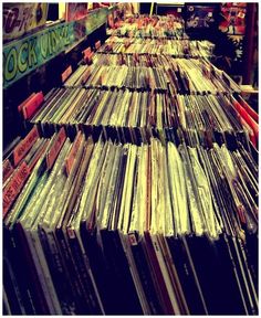 many records are stacked on top of each other