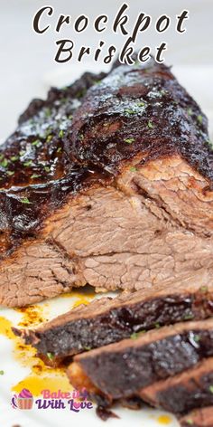 a close up of meat on a plate with the words crockpot brisket