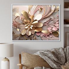 a living room scene with focus on the large flower art piece hanging above the couch