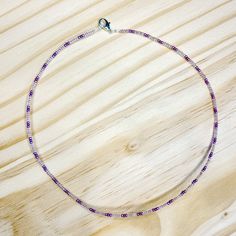 Approximately 15 inches long Made with seed beads on silver wire to prevent wear Spring ring closure stackable and dainty Purple Seed Beads Necklace, Diy Western Jewelry, Diy Western, Wire Choker, Girls Choker, Purple Punch, Western Jewelry, Silver Wire, Spring Rings