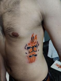 a man with a star wars tattoo on his chest