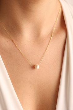 Dainty Pearl Necklace, Bridesmaid Gift, Bridesmaid Necklace Gift, Wedding Gift, Minimal Pearl Necklace, Gift for her Simple dainty necklace BRIDESMAID PEARL NECKLACE Best unique gift alternative,Bridesmaid Pearl Necklace ♡ The easiest way to show your 'LOVE' to yourself and your loved ones This Delicate single pearl necklace made of high quality Silver chain, Suitable for any occasion. Makes perfect gifts for wedding, holidays, birthday, Christmas, etc. * MATERIAL: High Quality Solid 925 Sterlin White Dainty Necklace For Formal Occasions, Delicate Bridal Necklace For Formal Occasion, Elegant Wedding Charm Necklaces, Delicate Anniversary Necklace With Delicate Chain, Classic Jewelry For Bridesmaids, Dainty Necklaces For Bridesmaids, Pearl White Dainty Necklace For Formal Events, Delicate White Necklace For Wedding, Elegant Charm Necklaces For Bridesmaid Gift