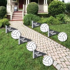 volleyball themed lawn decorations in front of a house