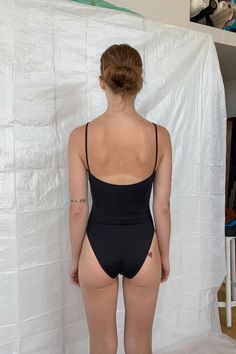 In 2015 our initial collection was based on four swim basics, the Straight One Piece is the one that started it all. Straps are wide set with our signature flattering straight neckline and finished with a mid-cut leg. The Cloud Top is the top version of the Straight One Piece and is a nice alternative for those who want this straight fit as a bikini set. The Straight One Piece is manufactured in New York City. Fit notes – The Straight One Piece fits true to size, we recommend to take your normal Sleek Swimwear With Built-in Bra For Summer, Sleek Summer Swimwear, Sleek Low Back Swimwear For The Beach, Sleek One-piece Swimwear For Beach, Sleek Swimwear For Poolside Summer, Sleek One-piece Beach Swimwear, Sleek Lined Swimwear For The Beach, Sleek Lined Swimwear For Beach, Sleek Bodysuit For Poolside With Moderate Back Coverage