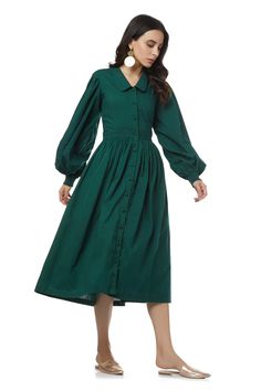 Forest green button-down midi dress with bishop sleeves and cinched waist.
Component: 1
Neckline: Spread Collar
Sleeve Length: Full
Fabric: Cotton
Color: Green
Bishop sleeves
Closure: Front buttons - Aza Fashions Green Long Sleeve Maxi Dress For Work, Green Lantern Sleeve Dress For Fall, Green Lantern Sleeve Fall Dress, Green Bishop Sleeve Dresses For Fall, Green Bishop Sleeve Dress For Fall, Puff Sleeve Midi Dress For Workwear, Midi-length Puff Sleeve Dress For Work, Puff Sleeve Midi Dress For Work With Buttons, Elegant Green Button-up Maxi Dress