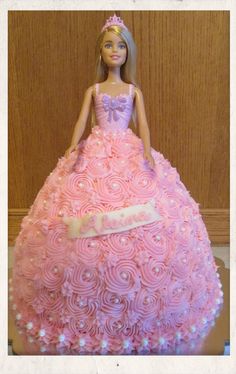 a barbie doll cake that looks like it has been made to look like a princess