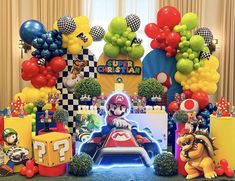 mario kart birthday party with balloons and decorations