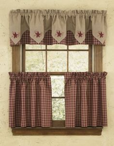 a red and white checkered window curtain with stars on the valance, in front of an open window