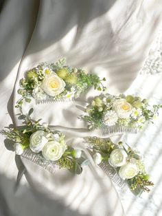 Grace White Eucalyptus Floral Hair Comb is a beautiful hair accessory that is perfect for a variety of special occasions, including weddings, proms, and other formal events. The hair comb features an array of delicate white flowers and greenery arranged in a lovely design, making it a wonderful choice for brides, bridesmaids, or flower girls. This Floral hairpiece is a faux Eucalyptus flower comb, meaning that it is made from artificial flowers and greenery, rather than real ones. This has the b White Eucalyptus, Floral Hairpiece, Eucalyptus Flower, Floral Hair Comb, Wedding Hairpiece, White Camellia, Faux Eucalyptus, Flowers And Greenery, Floral Hair Combs