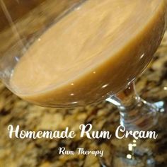 homemade run cream in a wine glass on a counter