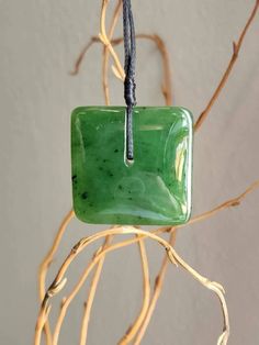 Canadian Jade Square Jade Pendant. Measures approximately 30mm on an adjustable wax cord Comes with or without our handcrafted wooden gift box Minimalist Waxed Cord Jewelry As Gift, Artisan Adjustable Rectangular Necklace, Artisan Rectangular Adjustable Necklace, Unique Waxed Cord Necklace As Gift, Adjustable Rectangular Jewelry Gift, Adjustable Rectangular Jewelry For Gifts, Artisan Jewelry With Adjustable Cord As Gift, Green Adjustable Cord Jewelry Gift, Artisan Jewelry With Waxed Cord For Gifts