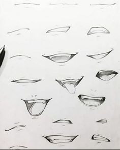 a drawing of various mouths and teeth with a pen in front of it on top of a sheet of paper