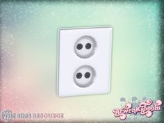 an image of two white buttons on a wall