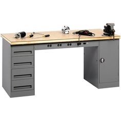 a workbench with drawers and tools on the top is shown in this image