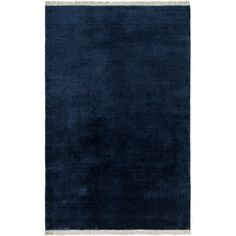 a dark blue rug with white trim