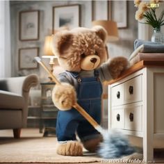 a teddy bear cleaning the floor with a mop