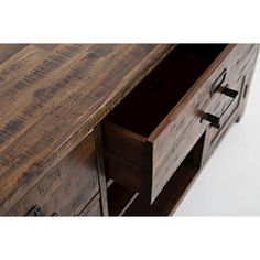 a wooden desk with two drawers and one drawer open