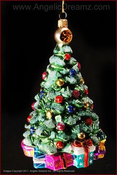 a christmas tree ornament with presents on it