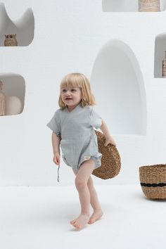 Transform your baby's wardrobe with our exquisite Muslin Short Kimono Romper. Designed for parents and gift-givers who seek both style and comfort, this romper is a testament to timeless elegance and superior quality. Welcome to a World Where Fashion Meets Function Our Muslin Short Kimono Romper offers unparalleled comfort and chic style, making it the perfect addition to your baby's clothing collection. Whether you're a proud parent, a thoughtful grandparent, or a friend searching for the perfe Kimono Wrap, Short Kimono, Muslin Fabric, Fine Yarn, Baby Warmer, Soft And Gentle, Style Chic, Printing Labels, Kimono Fashion