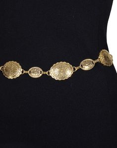 Catch the bohemian spirit and Southern California essence with our "Sunset Serenade Chain Belt." This piece is the perfect addition to take your outfit from simple to stunning with a nod to vintage charm. Fit: Adjustable chain for a customizable waist fit Style: Vintage-inspired, antique gold-tone conchos Occasion: Perfect for jazzing up a casual day look or adding flair to evening attire Styling Suggestions: Layer over a flowing maxi dress or cinch a billowy blouse for an effortlessly chic silh Vintage Festival Jewelry With Adjustable Chain, Bohemian Gold Chain Belt With Adjustable Chain, Adjustable Vintage Chain Belt, Bohemian Style Adjustable Metal Chain Belt, Bohemian Gold Chain Belt, Vintage Gold Chain Belt For Festivals, Gold Chain Belt For Summer Festival, Bohemian Gold Chain Belt - Perfect Gift, Bohemian Gold Chain Belt - Perfect As A Gift