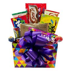 a colorful gift box filled with candy and candies