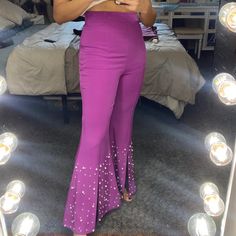 The Moon Size Medium Purple Pants With Pearls New Without Tags. Bought These Pants In A Boutique. Never Worn. Trying To Clean My Closet. See Video For Description. High Waist Purple Bottoms For Night Out, High Waist Purple Pants For Night Out, Purple Party Trousers, Purple Trousers For Night Out, Chic Purple Ankle-length Bottoms, Purple Flare Pants For Spring, Spring Purple Flare Pants, Moon Pants, Purple Pants