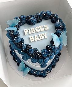 there is a cake in the shape of a heart that says piscs baby