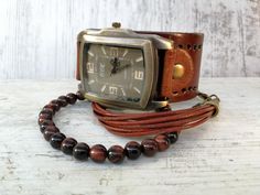 Brown Watch for Men Leather Cuff Watch Men Boho Watch for | Etsy Brown Watch Accessories With Rectangular Dial For Gifts, Brown Rectangular Dial Watch Accessories As Gift, Brown Rectangular Dial Watch Accessories For Gifts, Brown Analog Display Watch As Gift, Brown Watch With Rectangular Dial For Gift, Watch For Groom, Boho Watch, Men Boho, Leather Watch Cuff