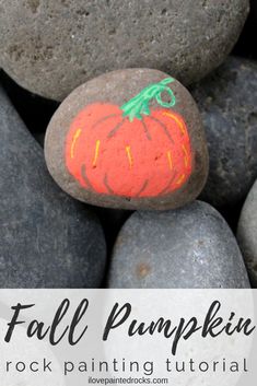 rocks with painted pumpkins on them and text overlay that reads fall pumpkin rock painting