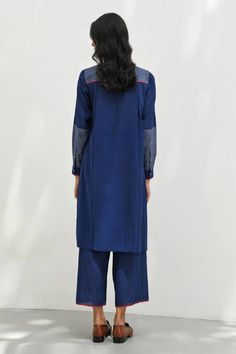 Navy handloom cotton dress with front smocked detailing, striped printed panelled sleeves and contrasting selvedge detailing on placket - Aza Fashions Cotton Dresses With Striped Sleeves For Spring, Cotton Dress With Striped Sleeves For Spring, Cotton Spring Dresses With Striped Sleeves, Spring Cotton Dresses With Striped Sleeves, Cotton Handloom Dress With Straight Kurta, Long Sleeve Indigo Cotton Dress, Blue Long Sleeve Kurta For Workwear, Indigo Long Sleeve Cotton Dress, Long Sleeve Cotton Silk Dress