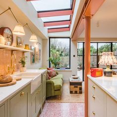 the kitchen is clean and ready to be used as a living room or dining area