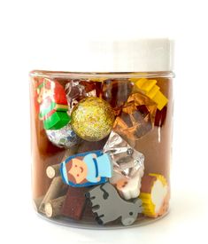 a jar filled with lots of different types of candies