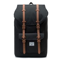 A popular mountaineering silhouette, the Herschel Little America™ backpack elevates an iconic style with modern functionality. Padded and fleece-lined 15" laptop sleeve Adjustable drawstring closure Magnetic strap closure with metal pin clips Front pocket with hidden zipper and key clip Internal media pocket with headphone port Contoured shoulder straps and air mesh back padding Classic woven label Dimensions: 19.5"(H) x 11.25"(W) x 7"(D)Capacity: 25 L. / RELY ON US. YOUR TRUSTED TRAVEL SOURCE. Black Saddle, Key Clip, Metal Pins, Herschel, Mountain Backpack, Black Backpack, Bradley Mountain, Laptop Sleeve, Laptop Sleeves