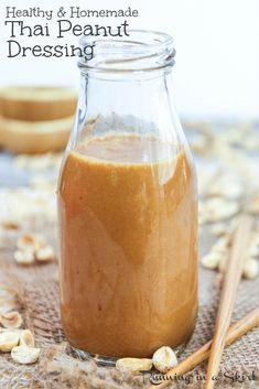 a jar filled with peanut butter sitting on top of a table